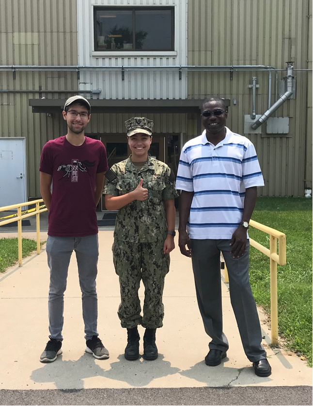 Figure 1: MIDN Amelia Scigliano pictured with Joey Dorsch and Dr. Yunusa Balogun.
